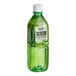 A case of green plastic bottles of Assi Aloe Juice with white labels.