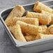 A tray of fried Chef One Buffalo Chicken Egg Rolls.