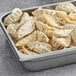 A silver tray of Chef One Chicken and Vegetable Dumplings.