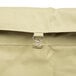 A beige canvas bag with a metal ring on it.