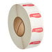 A roll of white labels with red writing that says "Wednesday" and "Dissolvable"