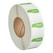 A roll of white labels with green text that says "Friday" and "DissolveMark"