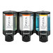 A close up of a black Aviva 3-chamber soap dispenser with translucent bottles and Paya logo.