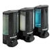 A black Dispenser Amenities Aviva 3-chamber wall-mounted soap dispenser with translucent bottles.