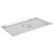 A Vollrath stainless steel deli pan cover on a stainless steel tray.
