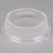 A clear plastic container with a round lid.