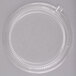 A clear plastic Fineline Platter Pleasers lid on a clear plastic plate.