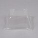 A clear plastic container with a square top.