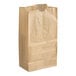 A natural kraft waxed paper bag standing upright.