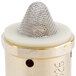 A metal cylinder with a wire mesh on top.