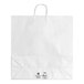 A white paper shopping bag with handles.