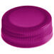 A close-up of a violet plastic cap for juice bottles.