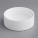 A 33/400 white plastic bottle lid with a white foam liner.