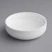 A 58/400 white dome lid with a foam liner on a white surface.