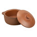 A brown Arcoroc Maria Portugal terracotta casserole dish with lid.
