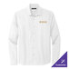 A Mercer+Mettle white long sleeve shirt with gold embroidery.