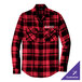 A Port Authority red and black plaid flannel shirt on a table.