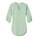 A Misty Sage Port Authority blouse with short sleeves.