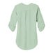 A back view of a Port Authority misty sage short sleeve blouse.
