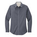 A Port Authority steel gray and light stone long sleeve poplin dress shirt for women.