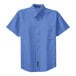 A Port Authority ultramarine blue short sleeve dress shirt with a button up collar.