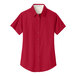 A red and light stone Port Authority short sleeve button down dress shirt for women.