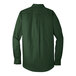 A Port Authority deep forest green long sleeve button down dress shirt.