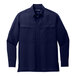 A Port Authority navy blue long sleeve shirt.