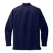 A back view of a Port Authority navy blue long sleeve shirt.