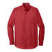 A Port Authority red long sleeve poplin dress shirt with a pocket.