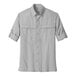 A Port Authority men's long sleeve grey shirt.