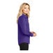 A woman wearing a purple and light stone Port Authority long sleeve button down dress shirt.