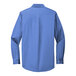 A Port Authority ultramarine blue long sleeve dress shirt.