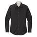 A black Port Authority long sleeve poplin dress shirt for women.