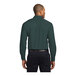 A man wearing a dark green Port Authority long sleeve dress shirt.
