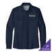 A Port Authority women's long sleeve navy shirt with a logo on the front.
