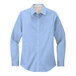 A light blue Port Authority long sleeved poplin shirt.