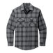 A Port Authority long sleeve flannel shirt in gray and black plaid with a close up of a pocket.