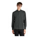 A man wearing glasses and a Mercer+Mettle anchor gray long sleeve dress shirt.