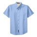A light blue Port Authority short sleeve button-down dress shirt with a pocket in the front.