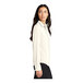 A woman wearing a Mercer+Mettle ivory chiffon blouse with long sleeves.
