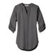 A Port Authority sterling grey short sleeve blouse on a hanger.