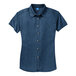 A Port & Company women's blue denim button-down shirt.