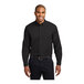 A man wearing a black and light stone Port Authority long sleeve dress shirt.