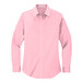 A close-up of a Port Authority light pink long sleeved shirt.