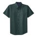 A dark green Port Authority short sleeve dress shirt with a buttoned collar.