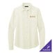 A Brooks Brothers women's off white satin blouse with long sleeves and full buttons.