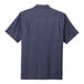 A Port Authority True Navy short sleeve staff shirt.