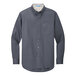 A Port Authority steel gray and light stone long sleeve button-up dress shirt.