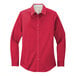 A red Port Authority long sleeve dress shirt for women.